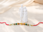 Shrifal Dhanyog Crystal Rakhi | Customised Statue | Pyrite, Tiger Eye & Green Aventurine Bracelet Rakhi for Brother | Personalized Raksha Bandhan Gift